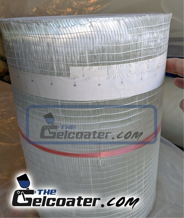a roll of 12 inch wide 11 ounce per square yard, 373 gram per square meter unidirectional fiberglass cloth with a tape measure showing roll width as 28 3/8 inches with The Gelcoater.com logo