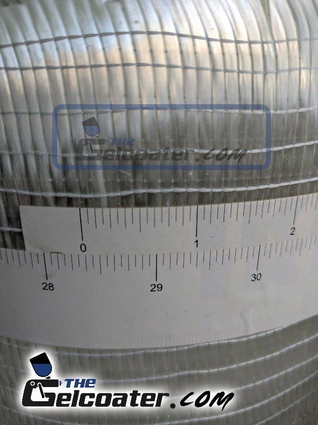 closeup photo of a roll of 12 inch wide 11 ounce per square yard, 373 gram per square meter unidirectional fiberglass cloth with a tape measure showing yarn width as 9 yarns per inch with The Gelcoater.com logo